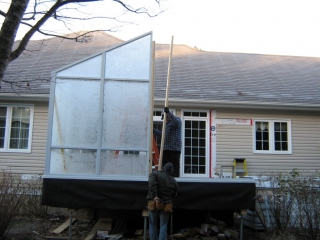 first front panel of sunroom being installed
