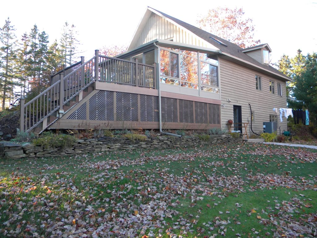 autumn patio and sunroom on rear of home