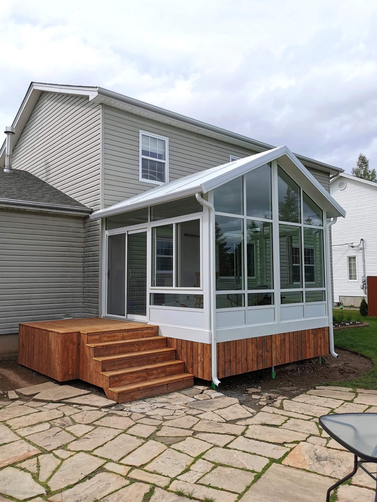 exterior image of new sunroom and steps